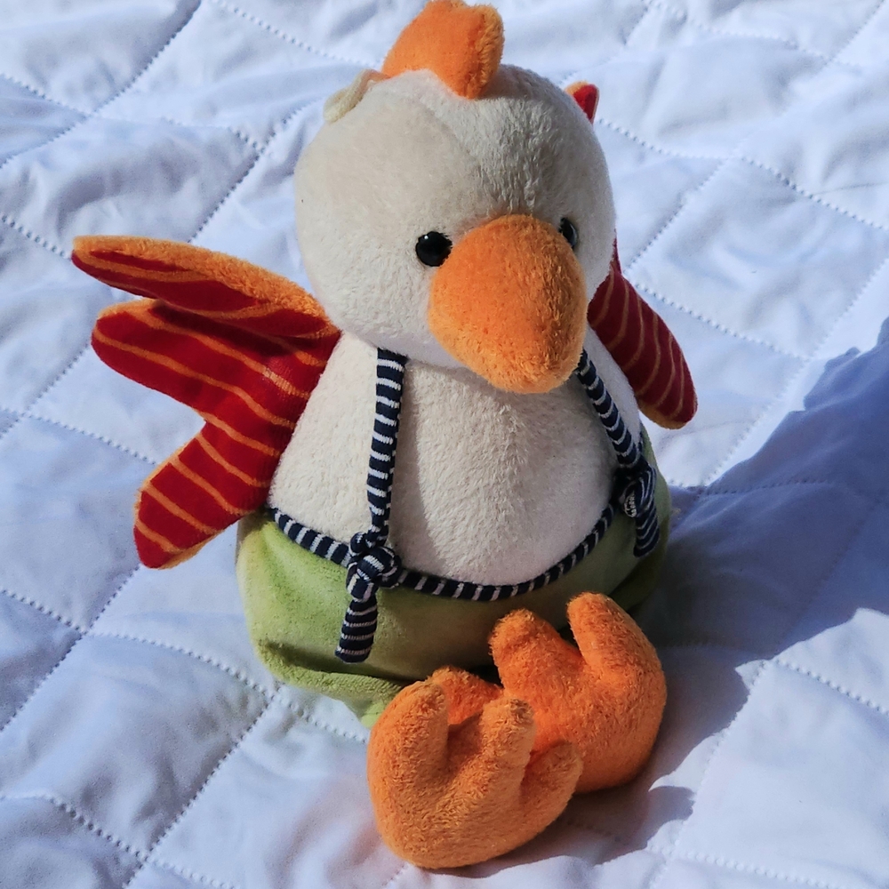 Plush Toy with Orange and Green Accents